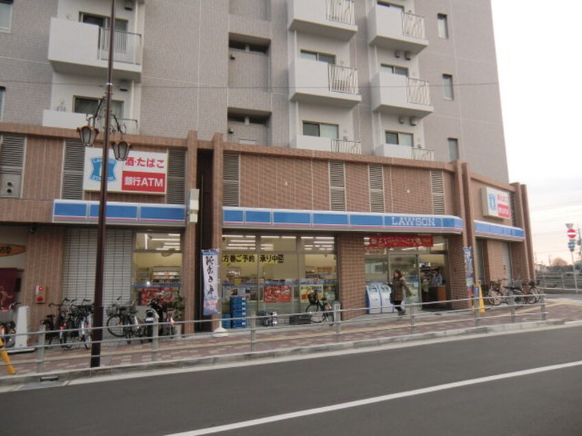 ローソン京阪牧野駅前店(コンビニ)まで356m 資生ハイツ
