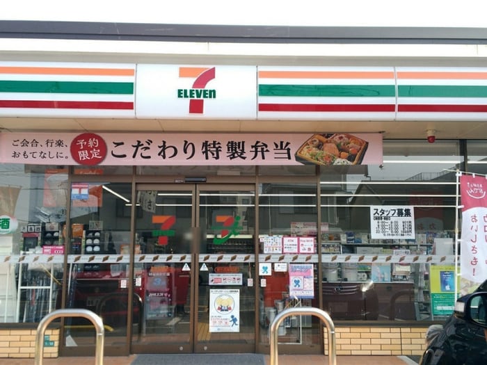 セブンイレブン(コンビニ)まで110m ハイツ カワイ