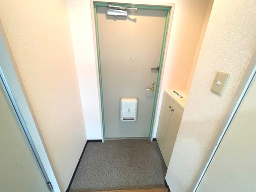 玄関 エヴァーグリーンタナカ