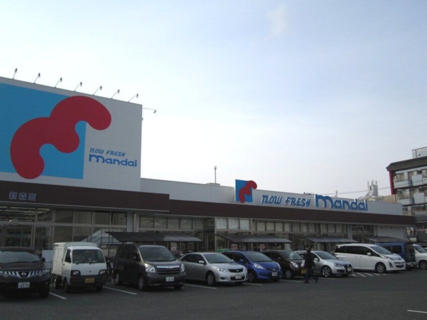 万代(スーパー)まで135m ニューフォレスト北野