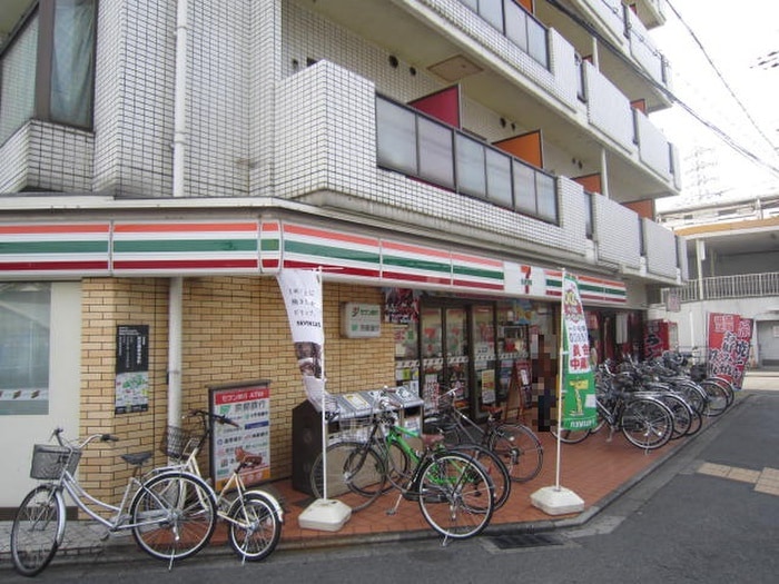 セブンイレブン(コンビニ)まで100m 全京都ハウジング壱番館