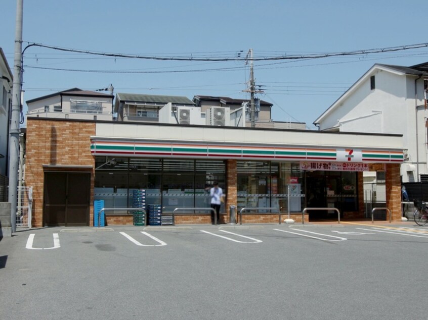セブンイレブン豊中服部本町１丁目店(コンビニ)まで212m 共栄マンション服部