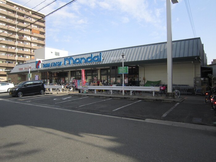 万代(スーパー)まで397m ロジュマン鶴見