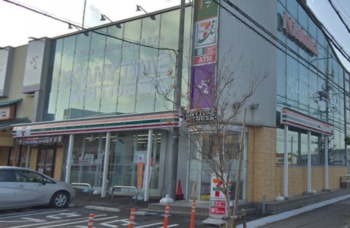 セブンイレブン(コンビニ)まで809m プレミアムスイート泉佐野