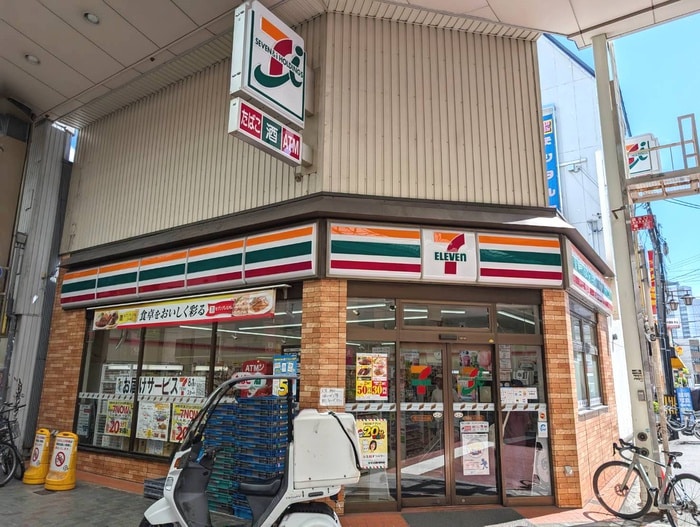 セブンイレブン(コンビニ)まで145m フロンティアタワー九条Ⅲ