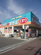 ドラッグセガミ守口藤田店(ドラッグストア)まで446m さくら館