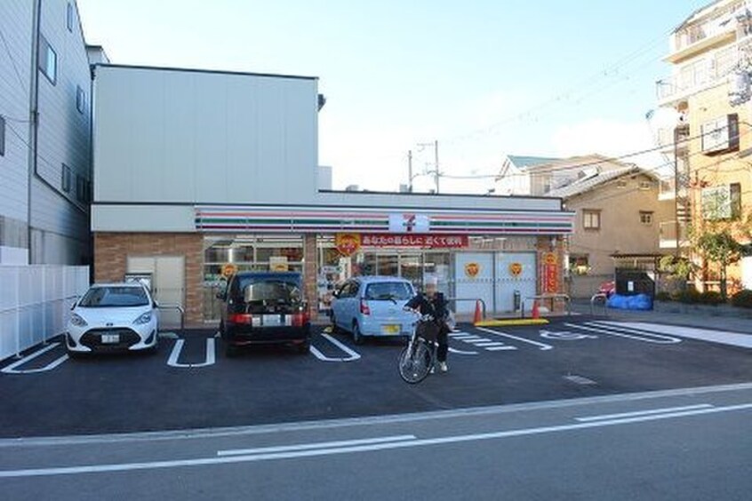 セブンイレブン大阪高殿6丁目店(コンビニ)まで450m 旭グランドハイツ