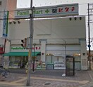 ファミリーマート薬ヒグチ鴫野店(コンビニ)まで350m シャーメゾン城東