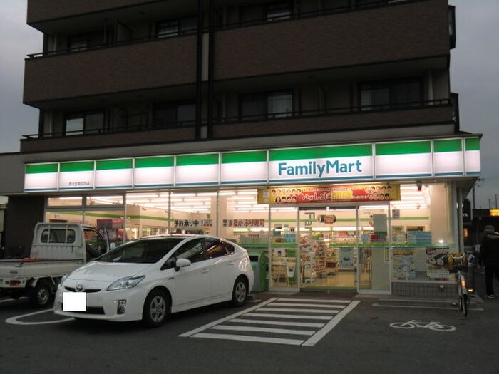 ファミリーマート招堤北町店(コンビニ)まで595m ラッフィナート　ソレイユ