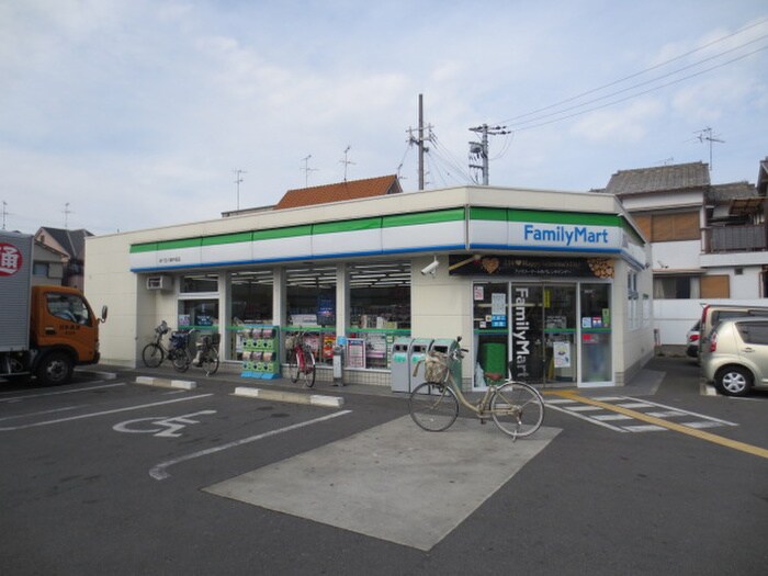 ファミリーマート八尾木北2丁目店(コンビニ)まで550m 乙菊