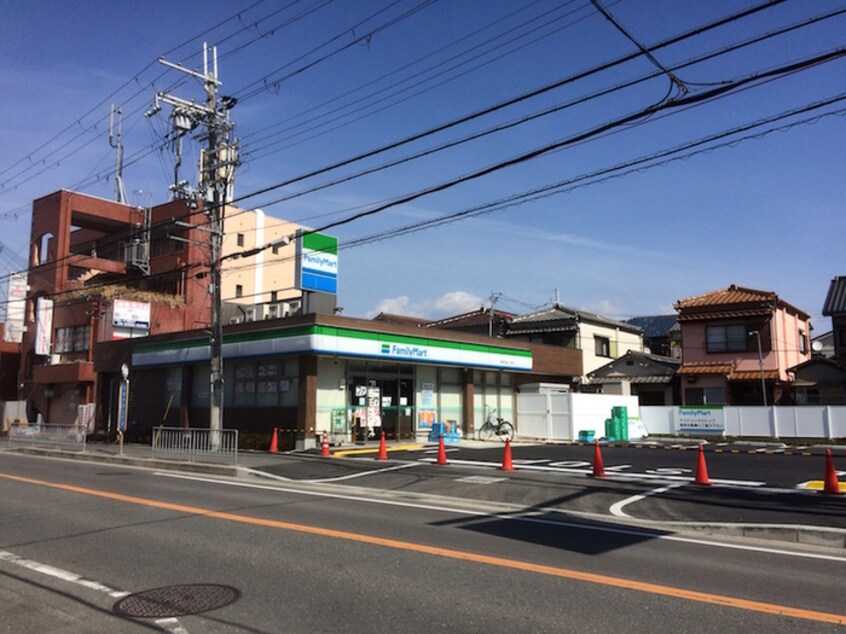 ファミリーマート摂津正雀三丁目店(コンビニ)まで390m 柴田ハイツ