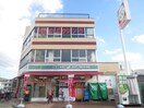 ローソンストア100尼崎富松店(コンビニ)まで480m アーバン・ビレッジ