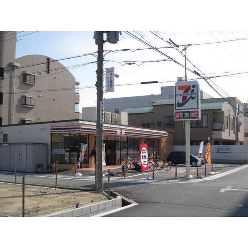 セブンイレブン阪急塚口駅東店(コンビニ)まで360m ＲＥＧＡＬ　ＣＯＵＲＴ塚口