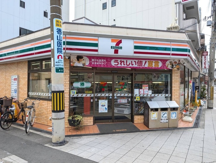 セブンイレブン(コンビニ)まで302m ｴｽﾘｰﾄﾞﾚｼﾞﾃﾞﾝｽ弁天町ｸﾞﾗﾝﾃﾞ