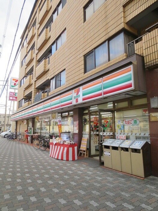 セブンイレブン門真堂山町店(コンビニ)まで303m ニューハイツ桜