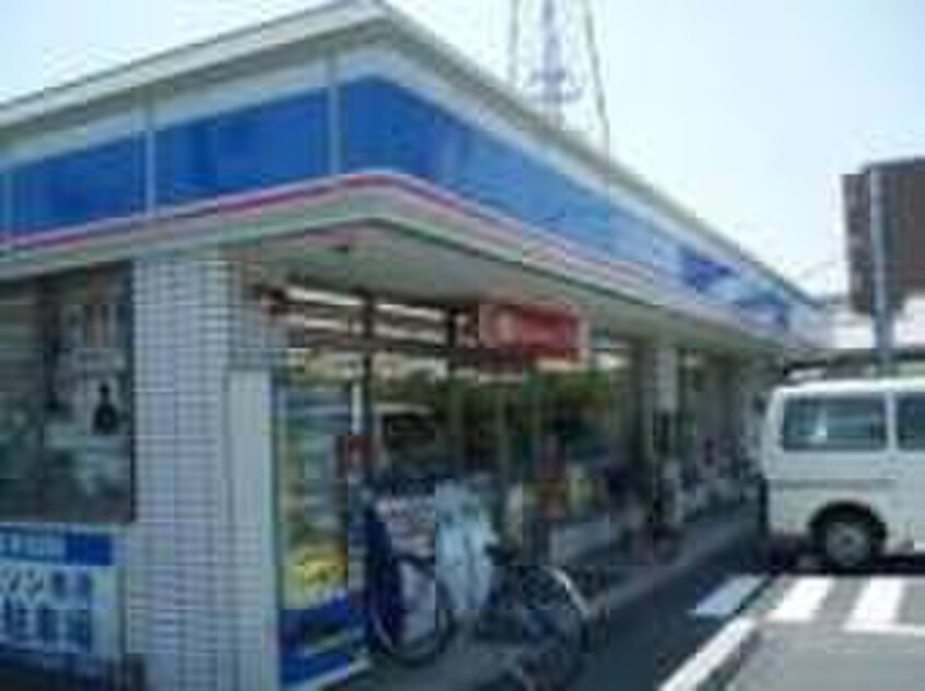 ローソン(コンビニ)まで1100m プレジェ－ネ一津屋