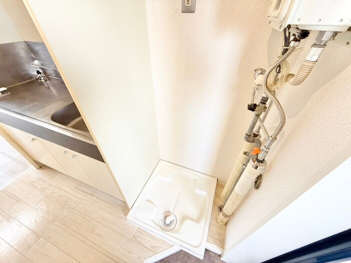 洗濯機置場 リアライズ富野荘