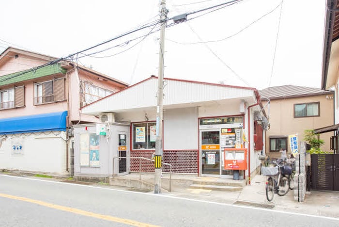 豊中春日郵便局(郵便局)まで200m エステート松尾