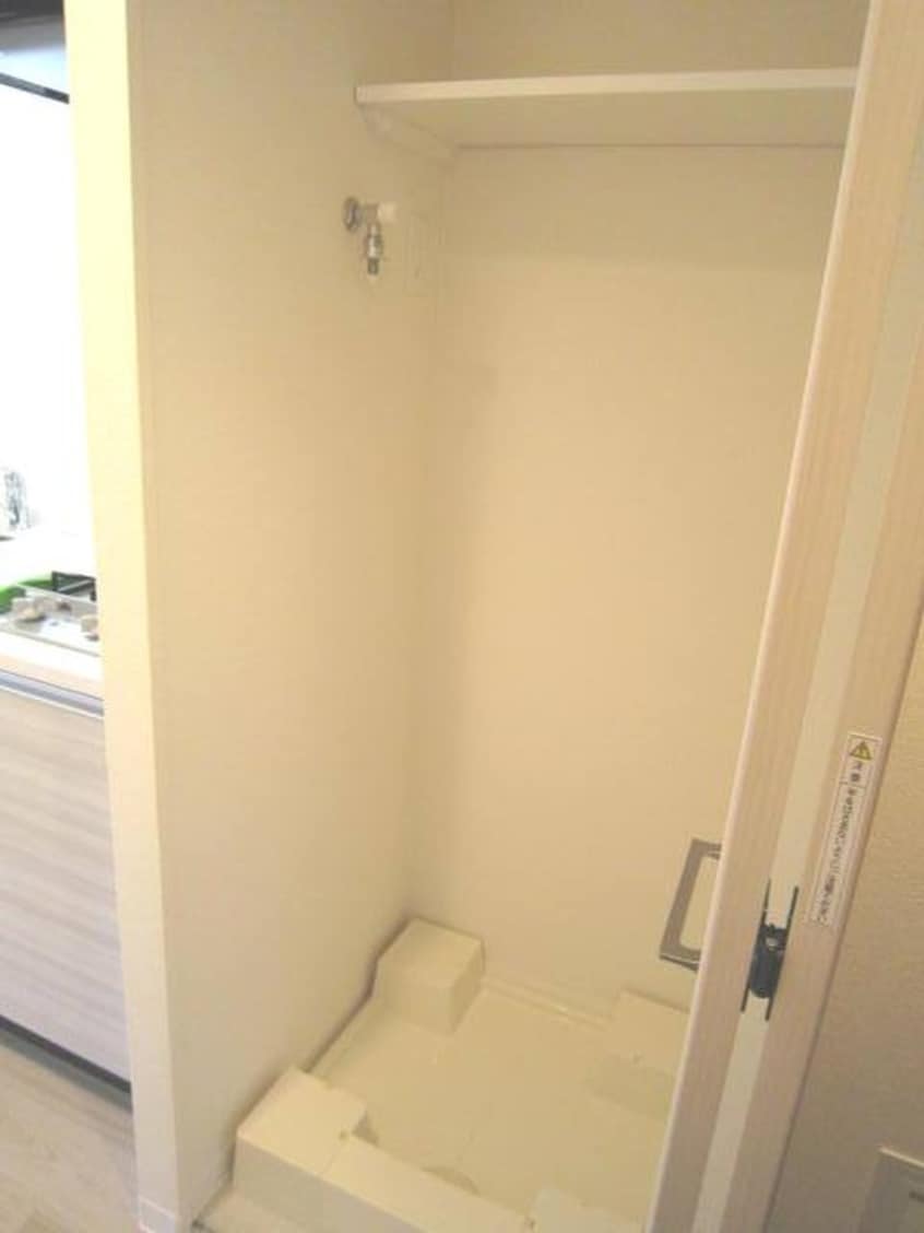 洗濯機置場 プレサンス新大阪ザ・シティ