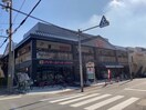 デイリーカナートイズミヤ 桑津店(スーパー)まで450m グロ－バルハイツ