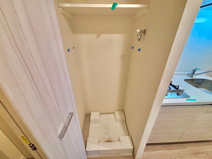 洗濯機置場 ﾌﾟﾚｻﾝｽ天神橋ｽｶｲﾙ(1202)