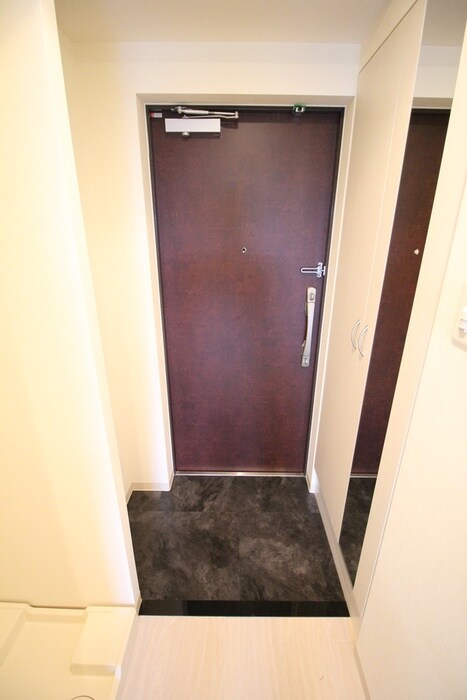 玄関 アリビオ千里豊津