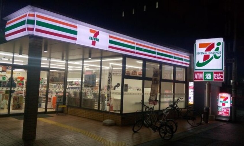 セブン―イレブン明神町店(コンビニ)まで110m アリッサム