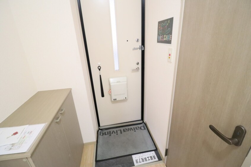 玄関 メルベ－ユ箕面Ⅱ