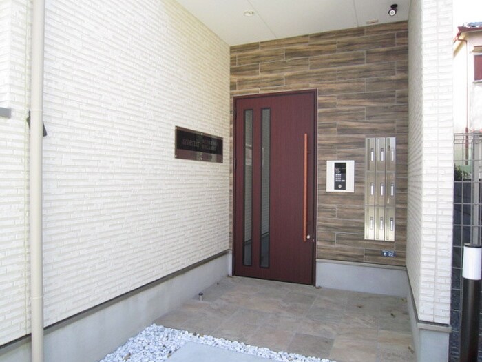 エントランス部分 アヴェニール千里丘東