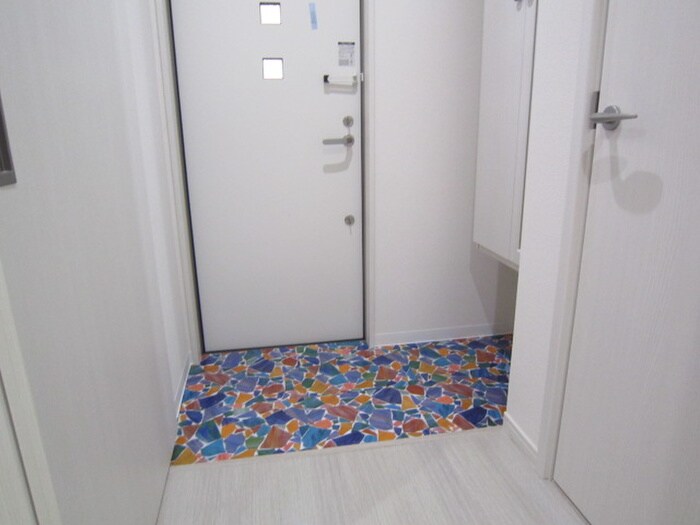 玄関 アヴェニール千里丘東