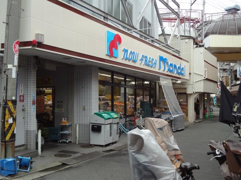 万代　小阪店(スーパー)まで597m コンフォ－ル小阪