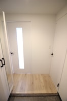 玄関 ウインズコート桜塚