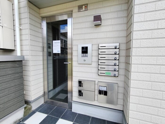 エントランス部分 ハーモニーテラス東野狐藪町