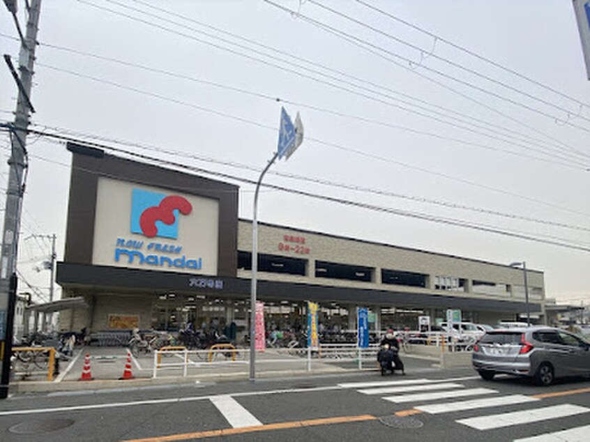 万代 六万寺店(スーパー)まで850m 上六万寺町9-12貸家