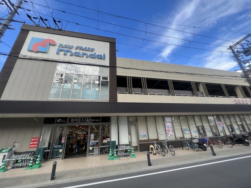 万代太子橋店(スーパー)まで110m 淀川パ－クハウスＤ号棟（706）