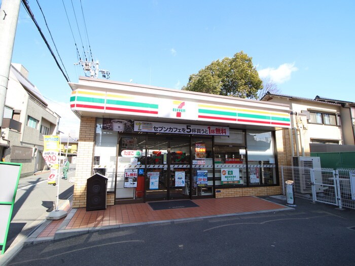 セブンイレブン柏里(コンビニ)まで2200m 八木ハイツ