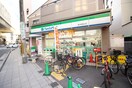 ファミリーマート 豊中駅西口店(コンビニ)まで528m サンパレス２１豊中