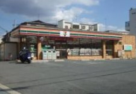 セブンイレブン柏原国分本町店(コンビニ)まで450m ヴェルジェ旭ヶ丘