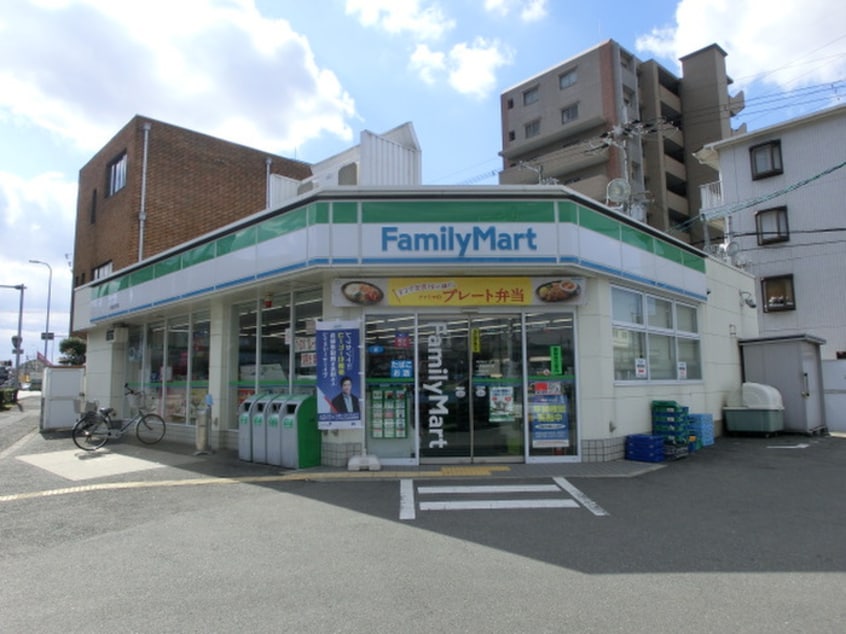 ファミリーマート八尾高安町店(コンビニ)まで337m ハーモニーＡ棟