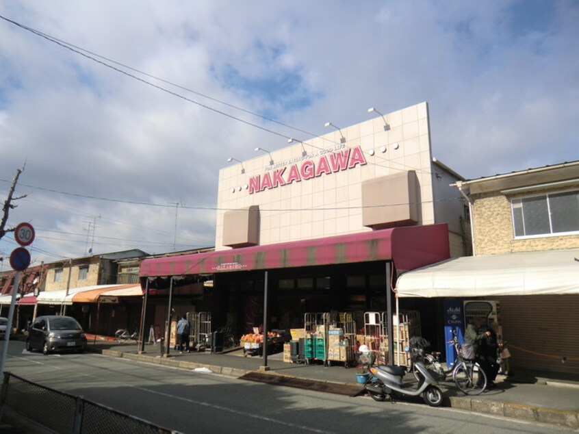 スーパーナカガワ男山店(スーパー)まで376m MAYUMIハイツ2番館