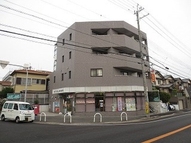 東山郵便局(郵便局)まで357m コンフォルタ楠葉