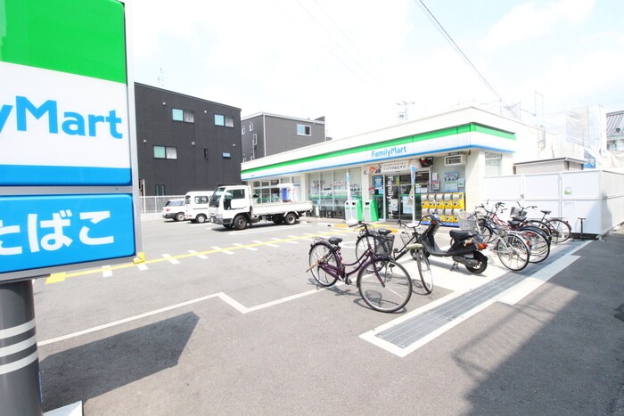 ファミリーマート俊徳道駅西店(コンビニ)まで517m エクセレントバ－ツ