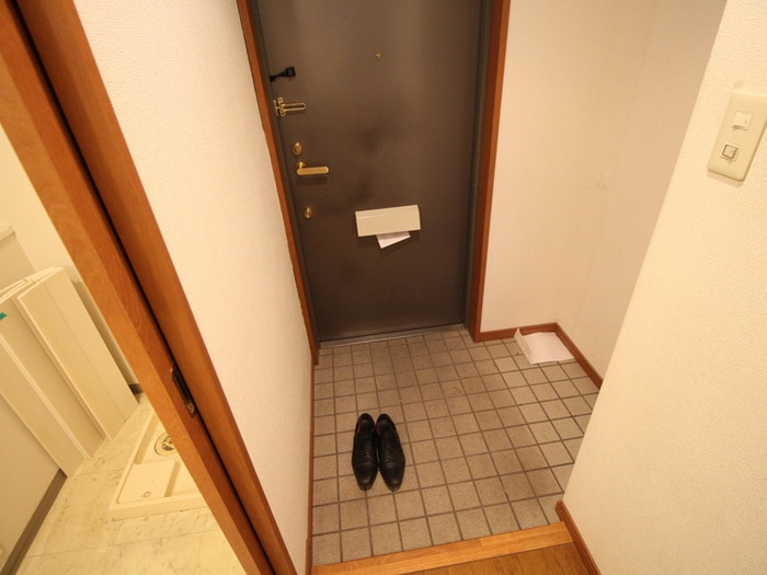 玄関 ﾎﾞﾇｰﾙ千里中央弐番館