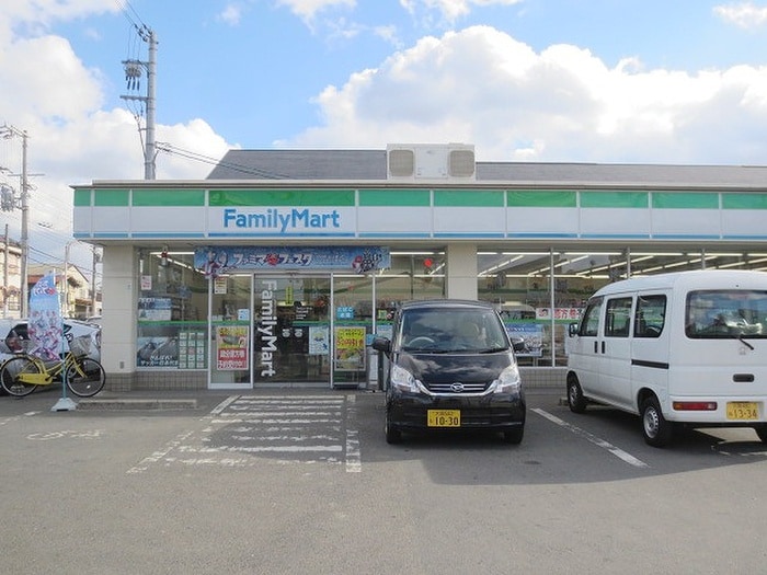 ファミリーマート門真北島店(コンビニ)まで57m リッツ五月田
