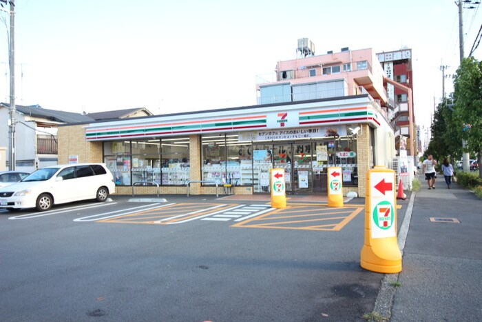 セブンイレブン(コンビニ)まで600m 多田駅前吉永ビル