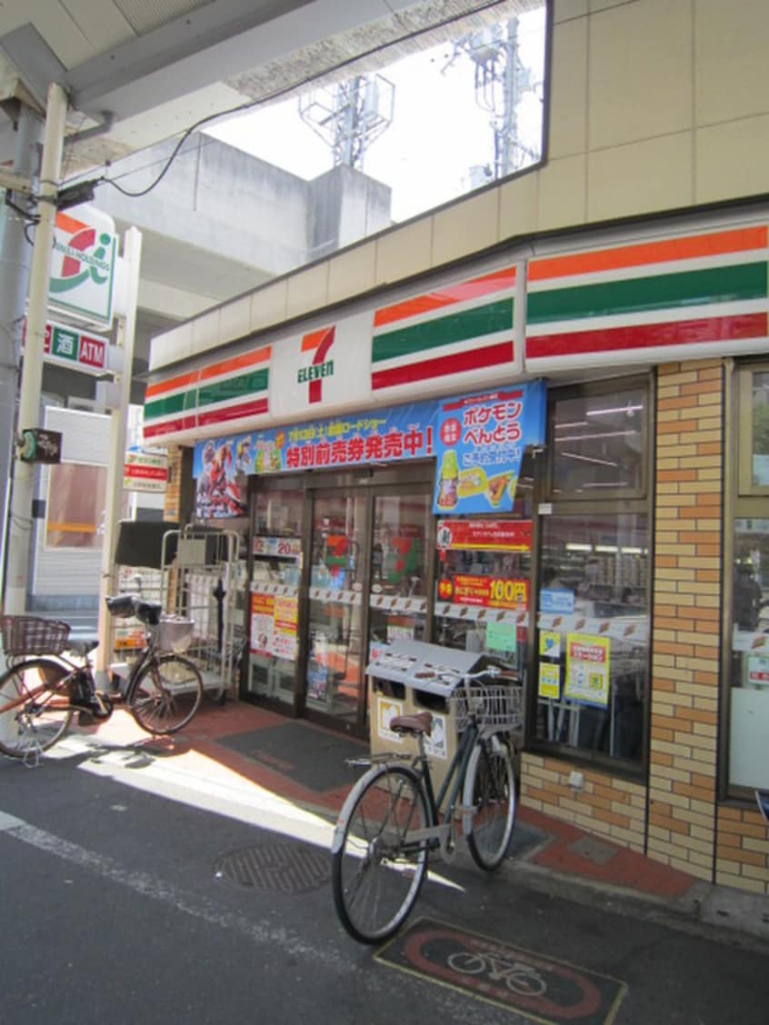 セブンイレブン(コンビニ)まで171m 北村マンション
