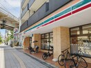 セブンイレブン(コンビニ)まで215m ｴｽﾃﾑｺ-ﾄ大阪ﾍﾞｲｴﾘｱ(404)