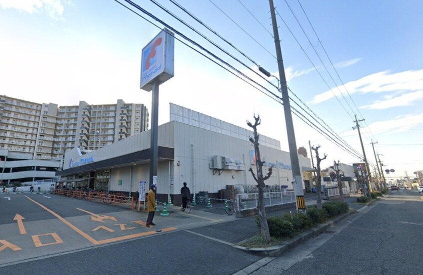 万代(スーパー)まで1500m マザーグース