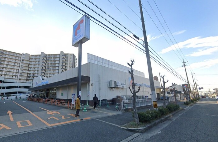 万代(スーパー)まで1500m マザーグース