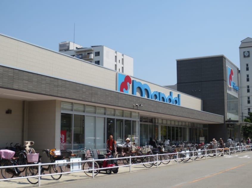 万代(スーパー)まで560m フェイバ－ハイツ